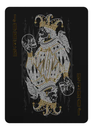 The gold Big Joker. Its face goes dark as the card turns away from the viewer.